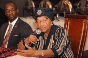 President Sirleaf speaking during meeting with development partners recently at Mamba Point Hotel.